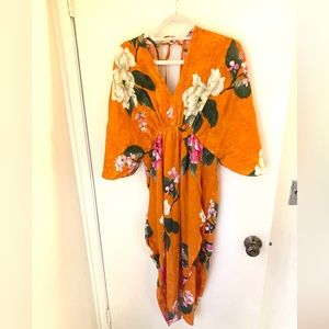 Bright orange floral maternity dress. Great for baby shower or maternity shoot